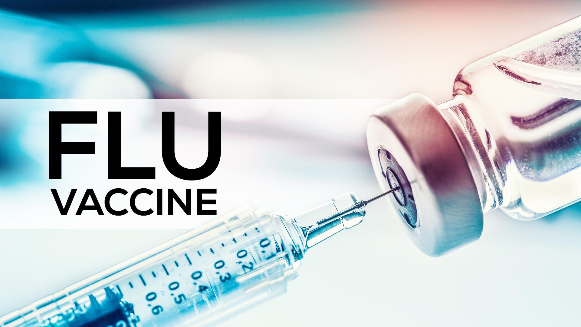 syringe and words flu vaccine