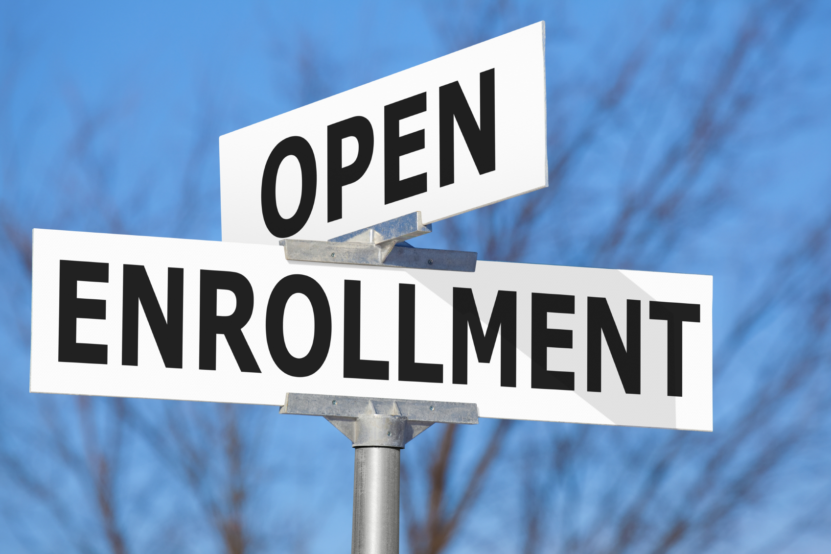 Street sign that says open enrollment